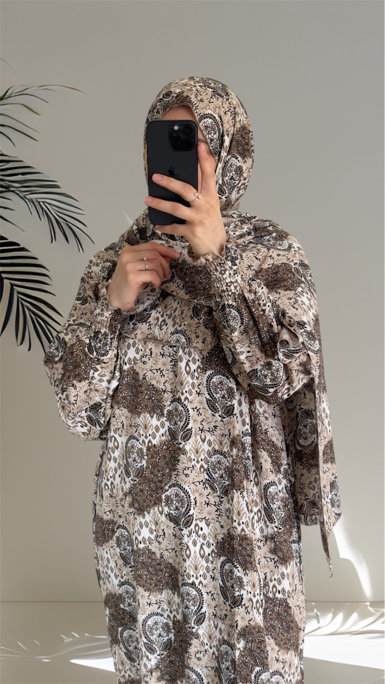 Muslim cleaning before prayer in traditional attire